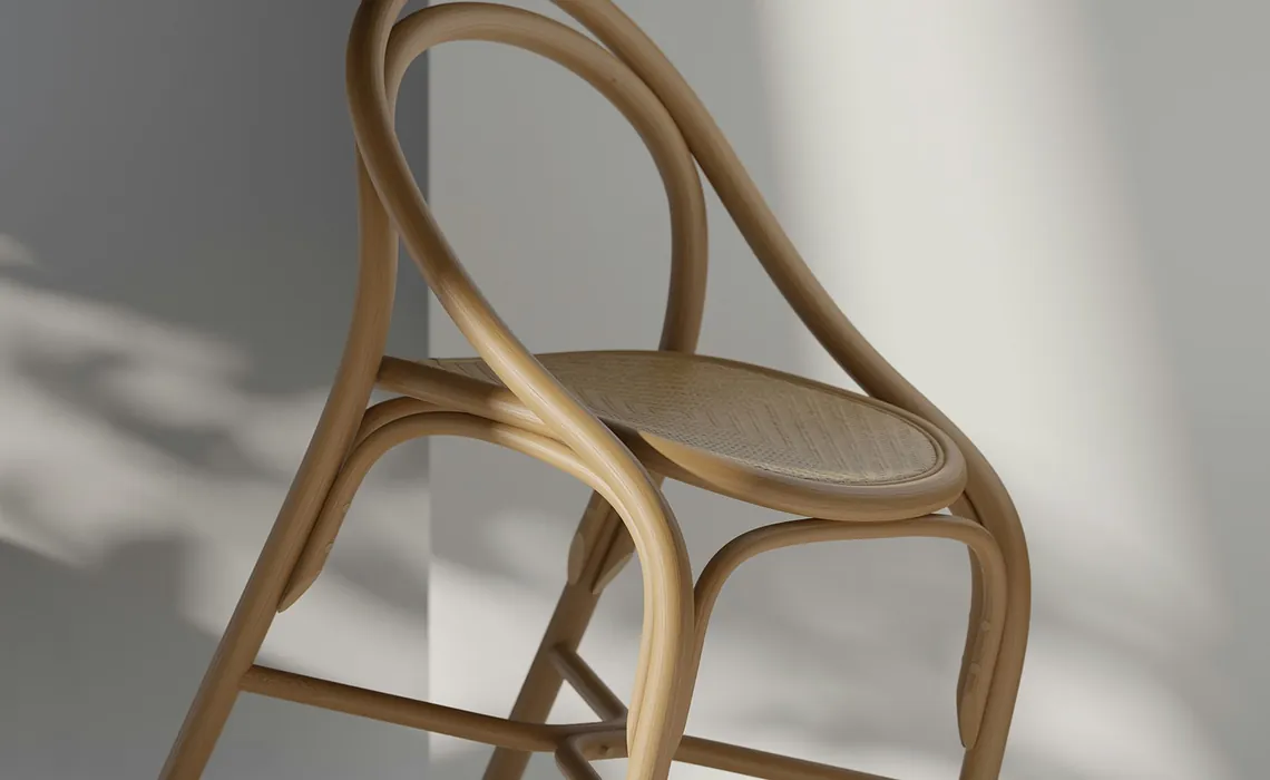 Wooden chair against a textured wall