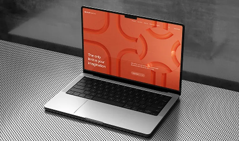 Brand strategy workspace with laptop and brand materials